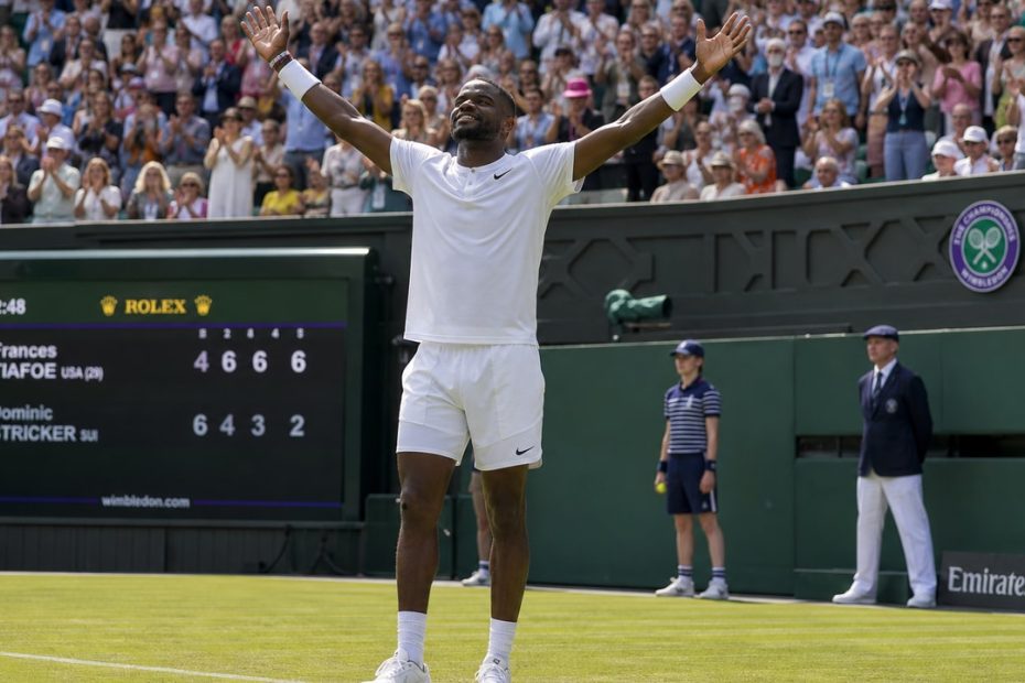 Frances Tiafoe celebrating victory on grass court at the 2026 Halle Open