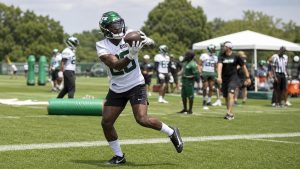 Breece Hall catching a pass for the New York Jets during practice