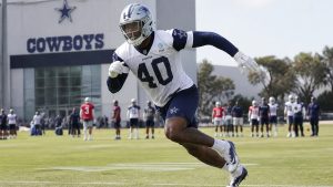Von Miller pass rushing in a Dallas Cowboys jersey