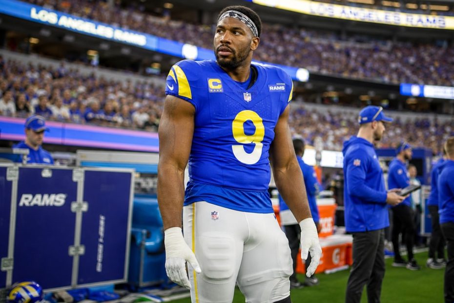 Myles Garrett standing on the sideline in a Los Angeles Rams jersey during a game