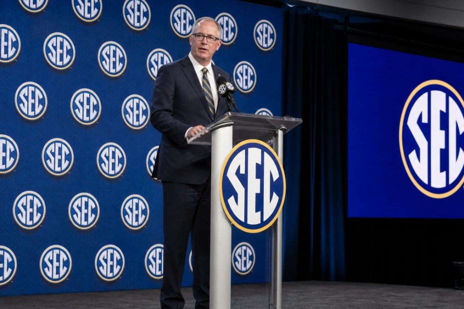 Greg Sankey speaking at a press conference as SEC commissioner
