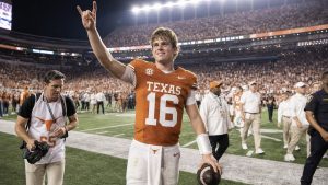 Arch Manning and the Texas Longhorns celebrate after the comeback win that vaulted them to No. 1 in the AP Top 25 poll