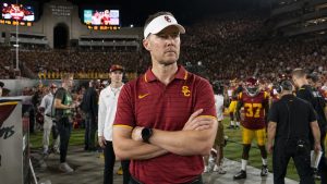 Lincoln Riley on the USC Trojans sideline during a game at the Los Angeles Memorial Coliseum