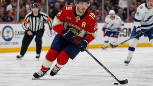 Matthew Tkachuk skating with the puck for the Florida Panthers in an NHL game
