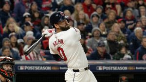 Petey Halpin of the Cleveland Guardians swinging at Progressive Field during the ALCS against the Tampa Bay Rays