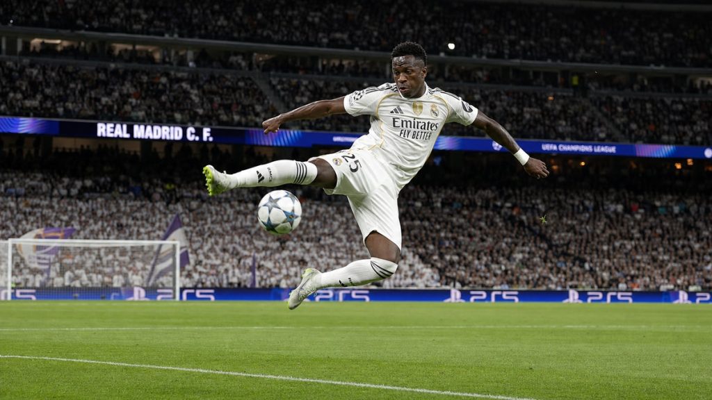 Yan Diomande volleying for Real Madrid at the Santiago Bernabeu